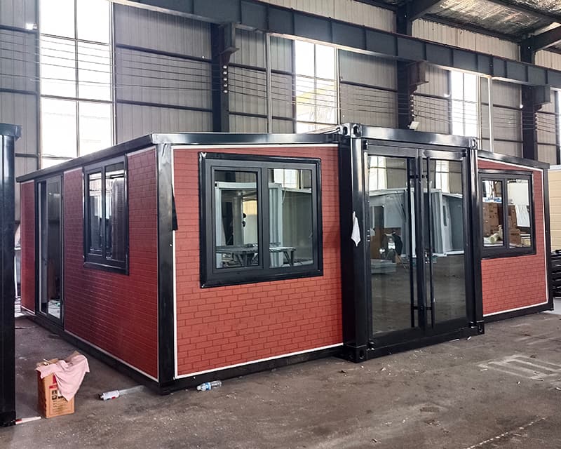 Expandable house with exterior cladding 6