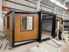 Cowinlife 20ft Teak color standard configuration expandable container house with 2 bedrooms 1 bathroom and 1 kitchen 2